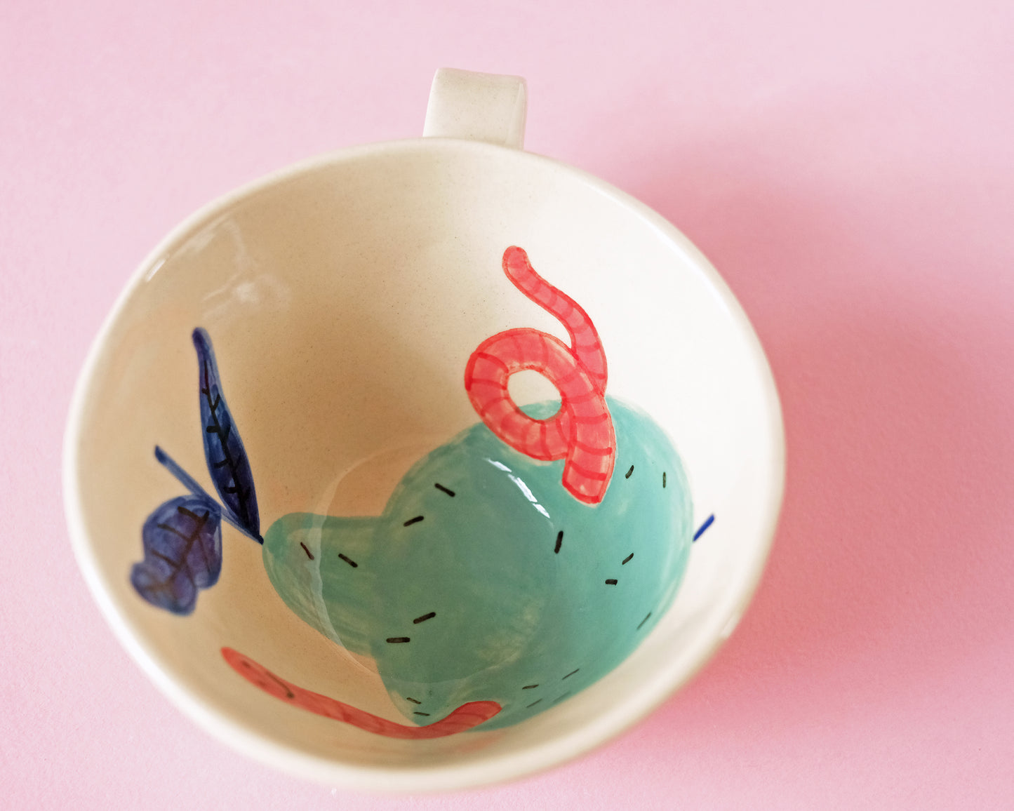Cup with an Apple and Snake