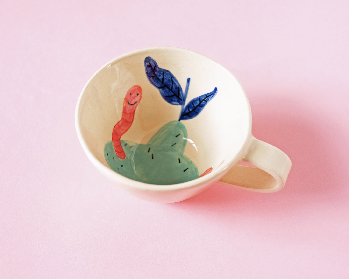 Cup with an Apple and Snake