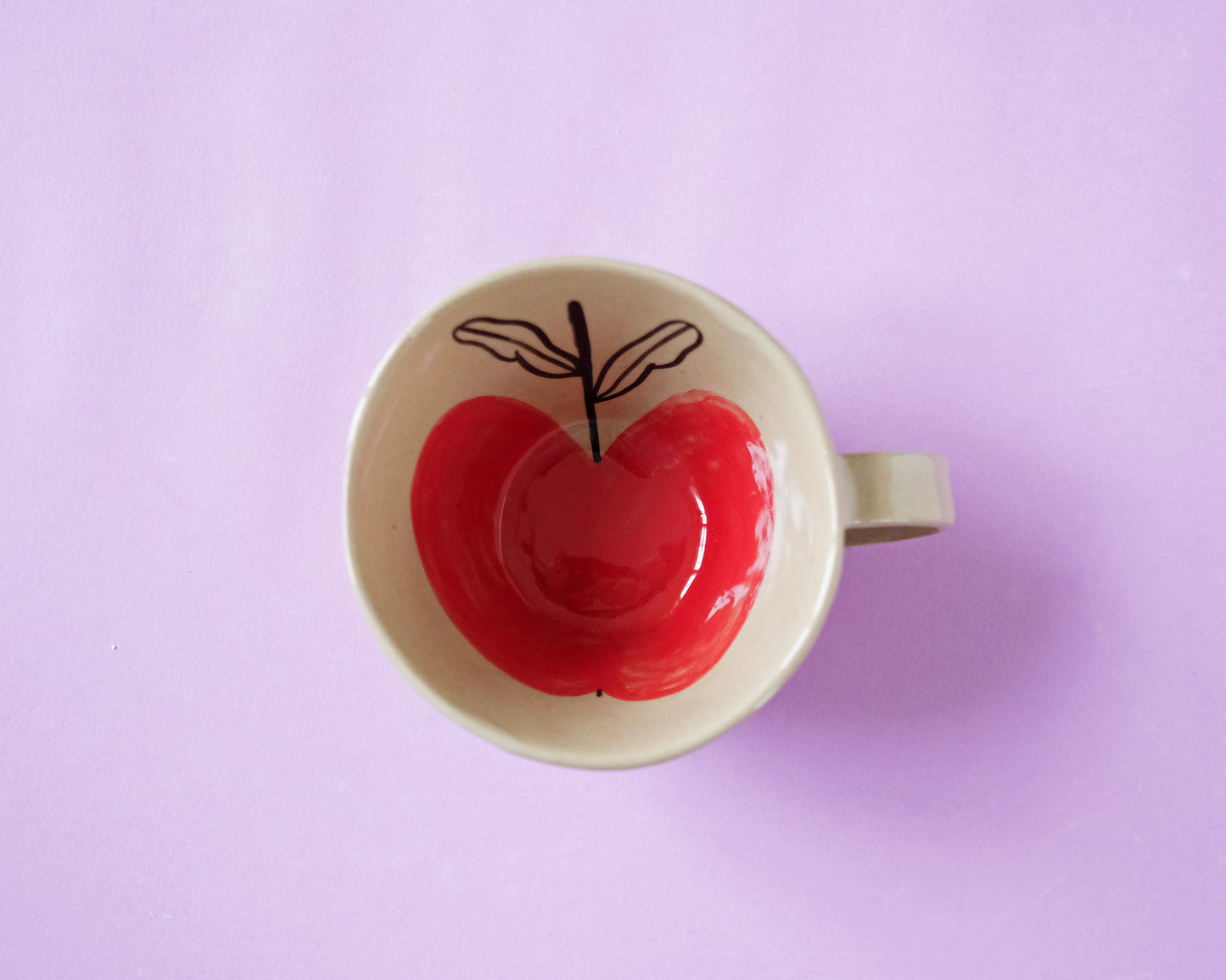 Cup with an Apple and 2 Running Horses