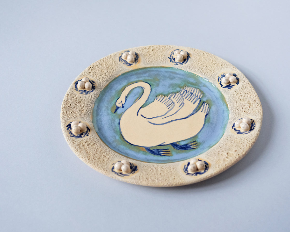 Swan plate