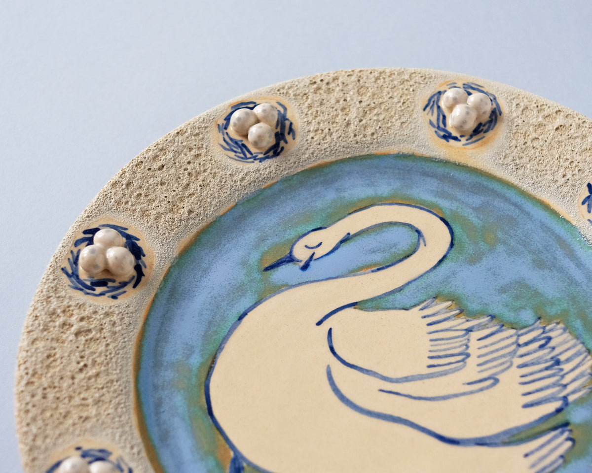 Swan plate