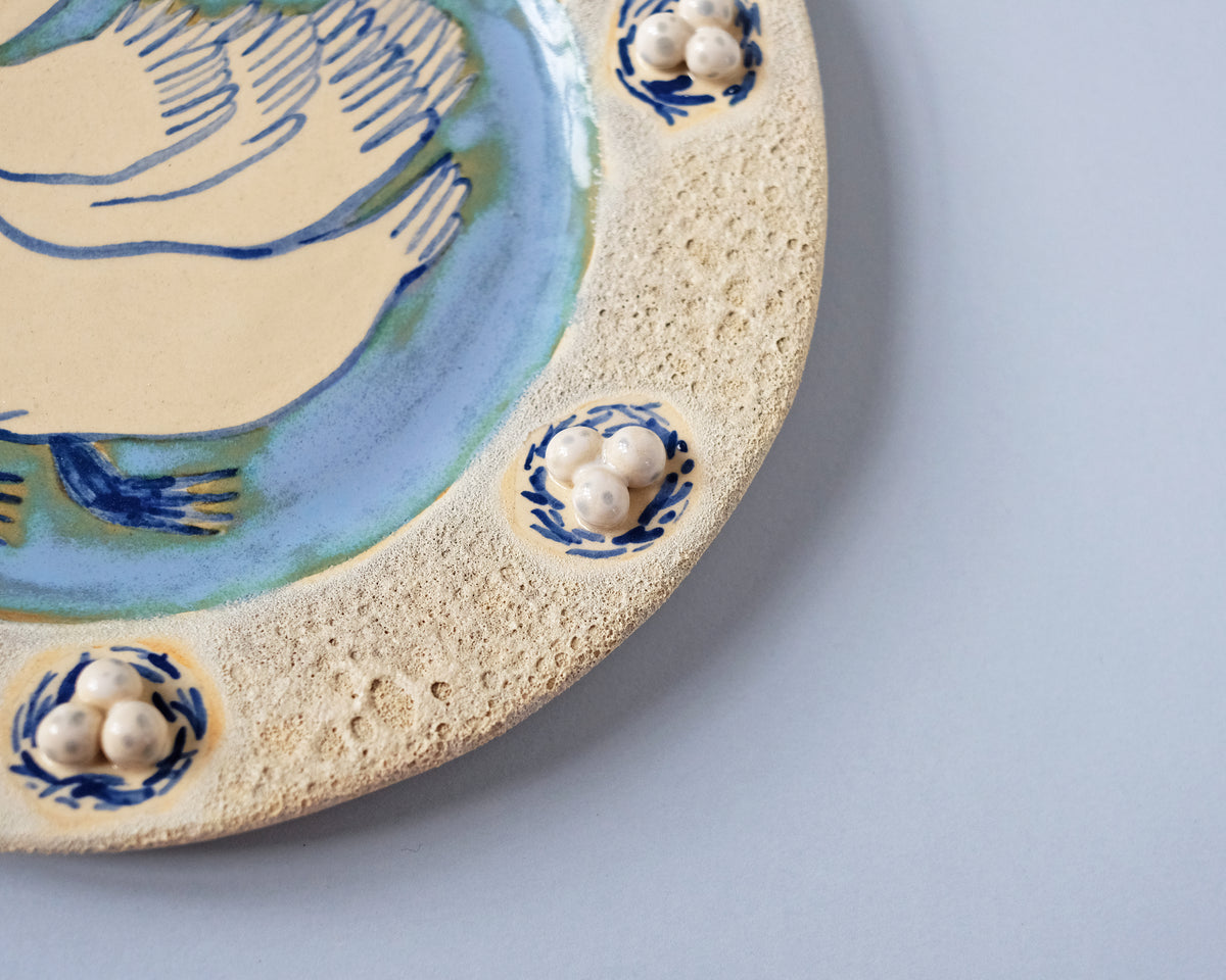 Swan plate