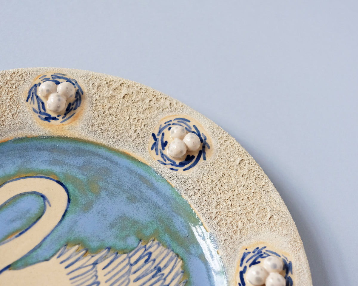 Swan plate